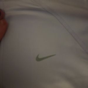 Womens Nike Dri fit 3/4 zip pullover. Lavender and dark purple.  Size small